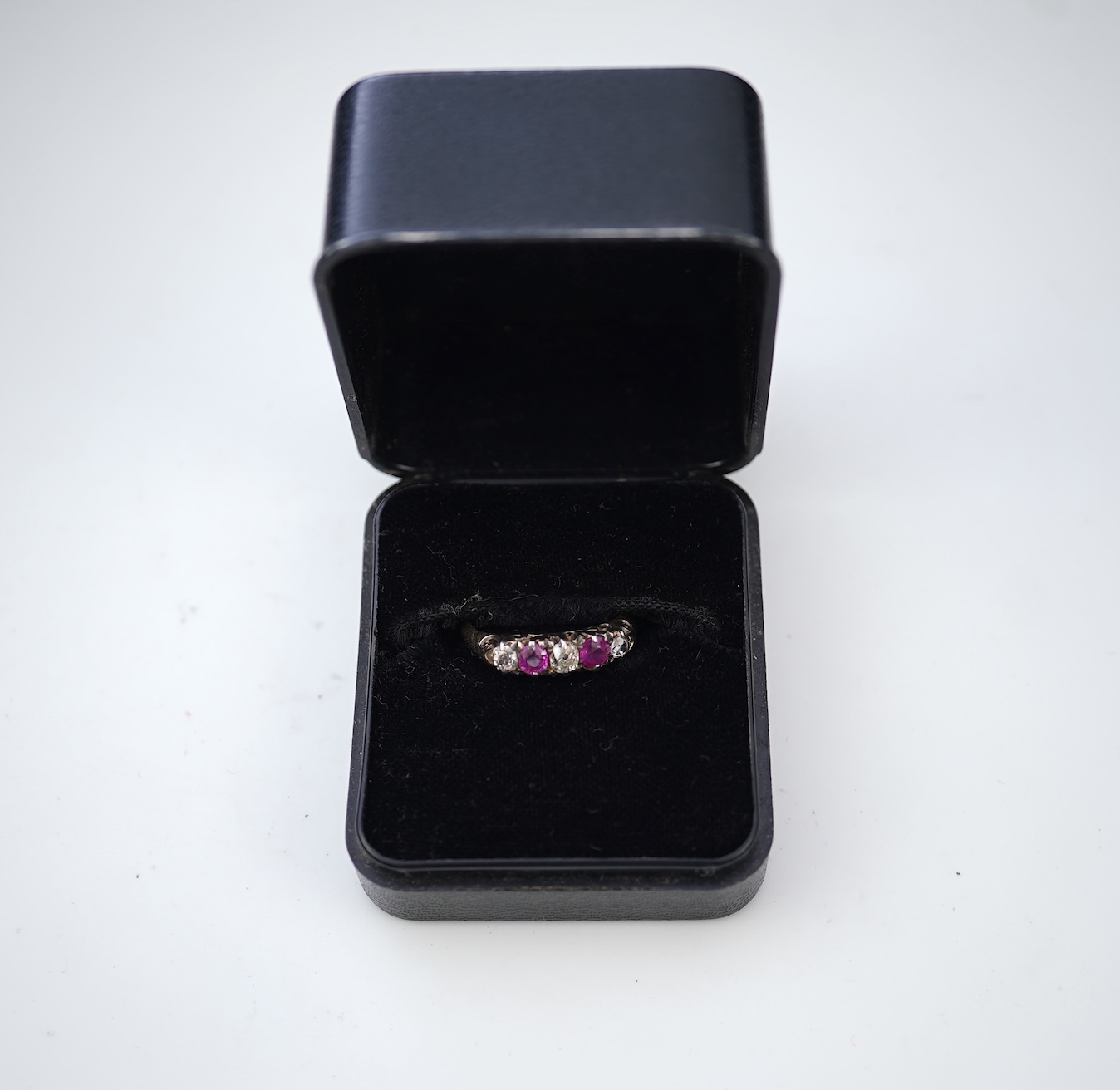 A pink sapphire and diamond ring, early 20th century
